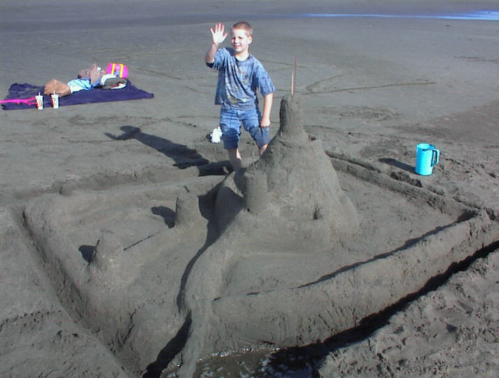Kegan at Long Beach working on the best Sand Castle ever.